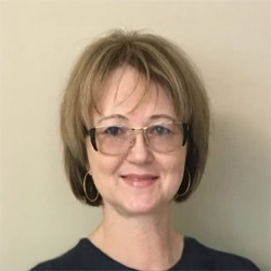 A headshot photo of Dr. Tatyana Brayman, a dentist at Evolve Dental